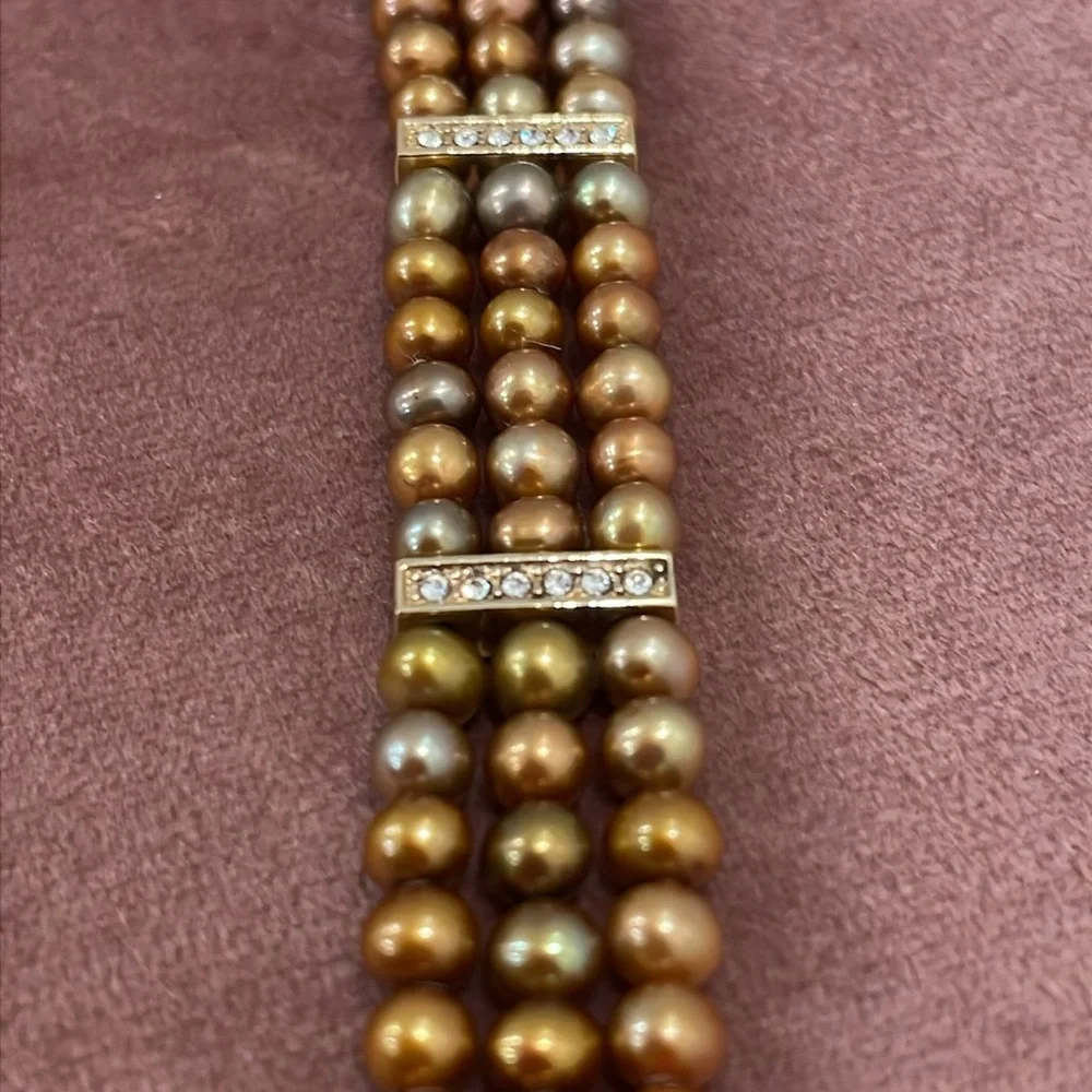 Gold Tone Three Strand Bracelet with Cultured Pearls and Rhinestones